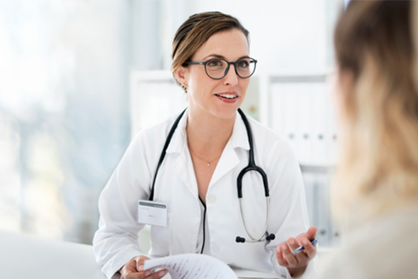 Cropped shot of a provider explaining something to a patient